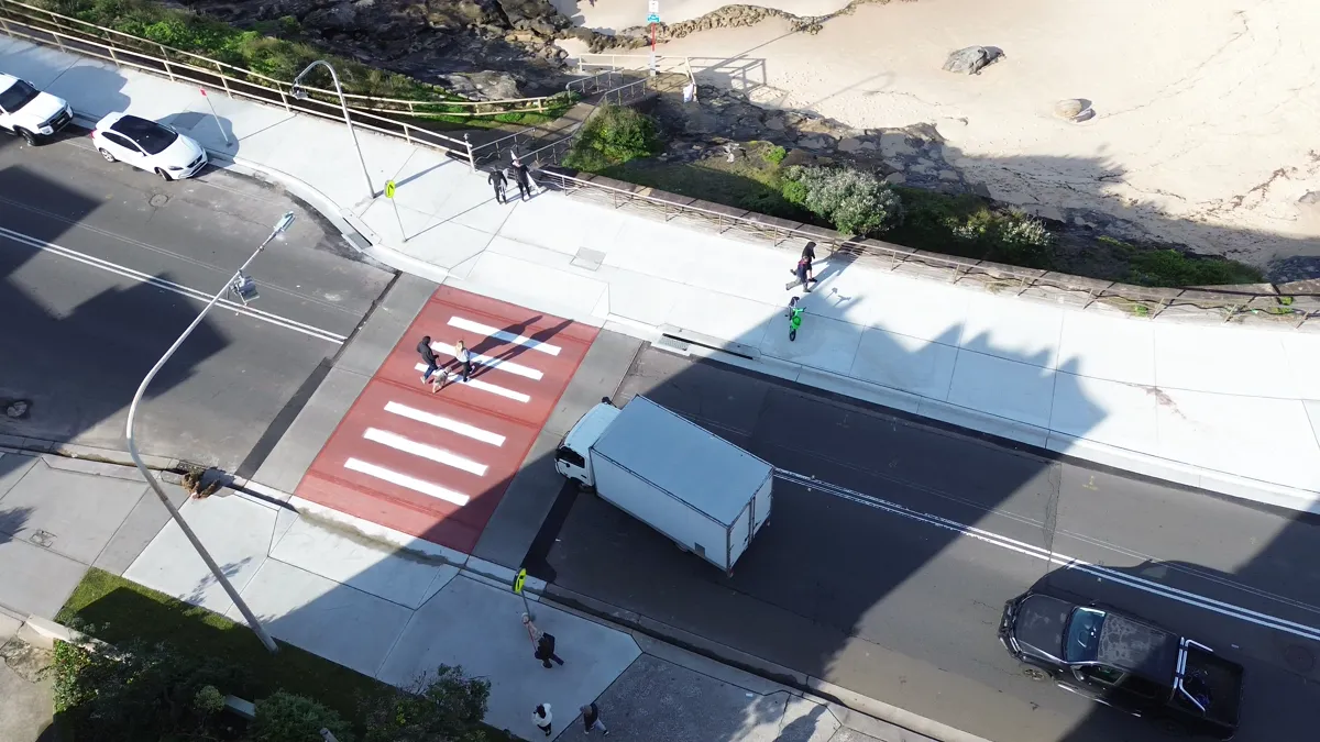 Removalist moving truck near a pedestrian crossing in Maroubra